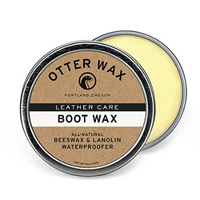 otter wax with half cap open on white background