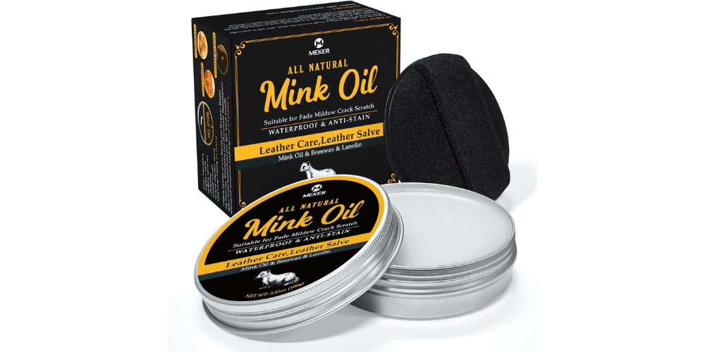 Meker mink oil can with half open cap alongside the box of the can