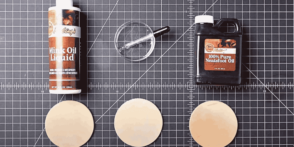 mink and neatsfoot oil bottles lying on a table